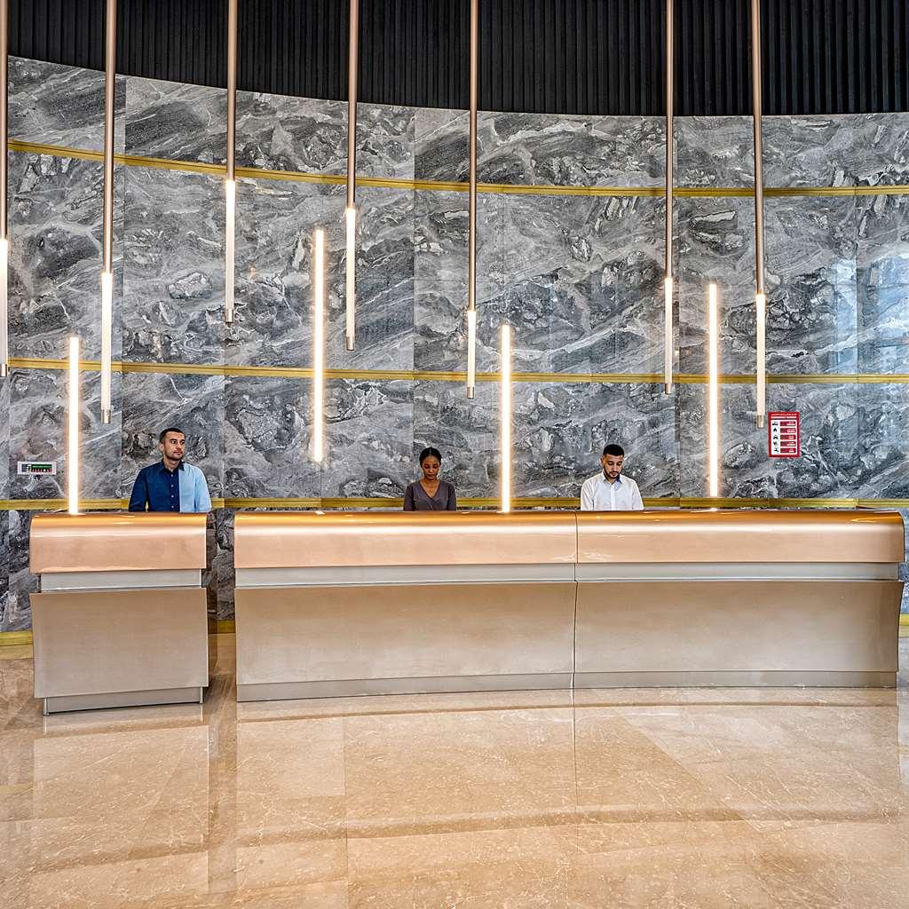 Hotel The First Collection Dubai Business Bay Wnętrze zdjęcie Reception desk